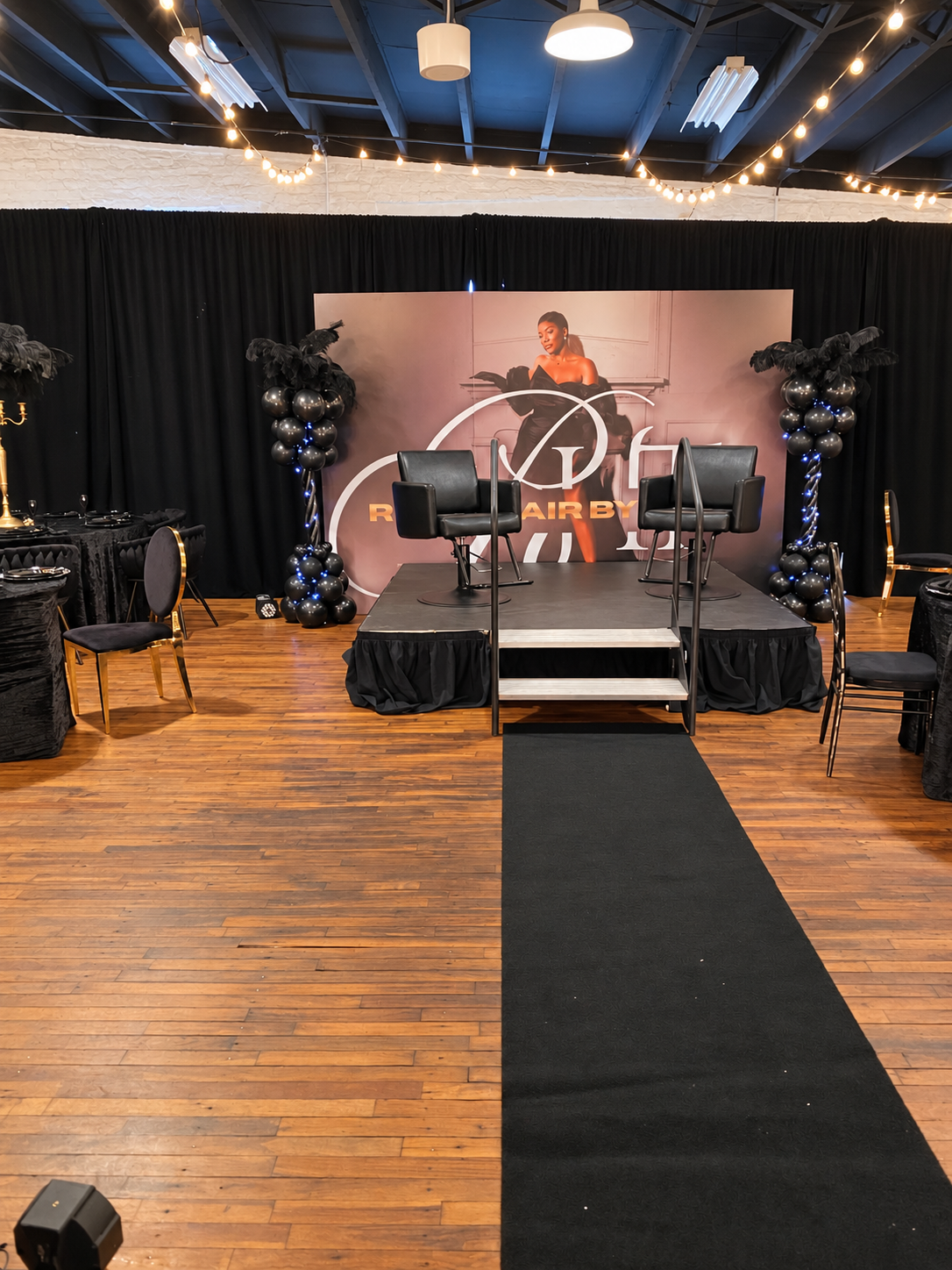 Statement celebration backdrop and aisle